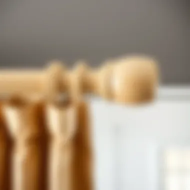 Close-up of a beige curtain rod showcasing its material and finish