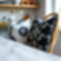 Elegant black and white cushions on a modern kitchen chair.