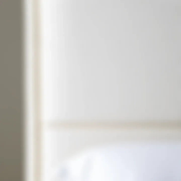 Close-up of plush fabric texture on a white upholstered headboard