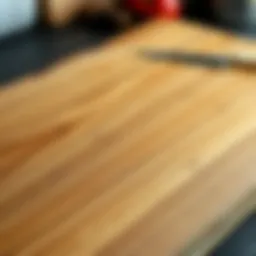 Close-up of a beautifully crafted wooden block cutting board with natural grain patterns