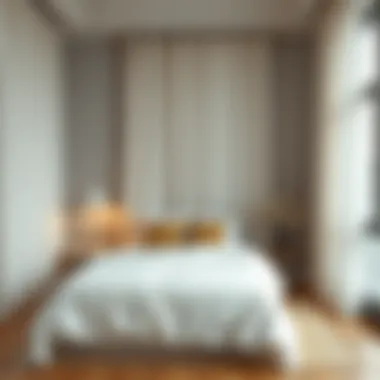 Cozy bedroom showcasing soft white curtains for a serene atmosphere